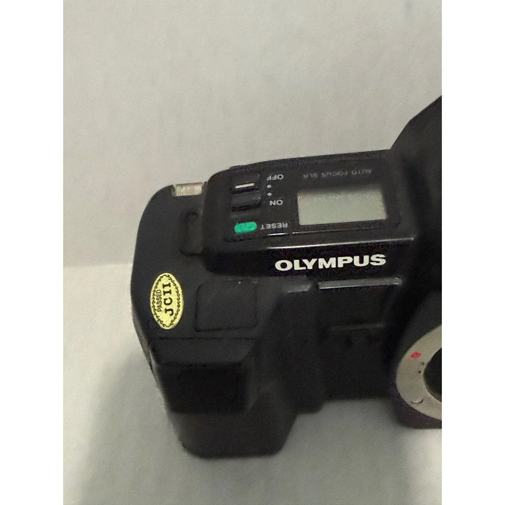 Vintage Olympus OM77AF SLR Film Camera Body Black Good Condition 2067999
